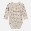 Hust and Claire slåom body, uld-bambus, wheat melange-off-white med print